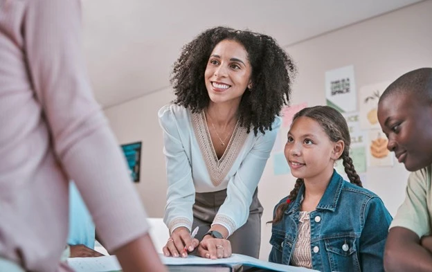 Teacher having a meeting with parents and child